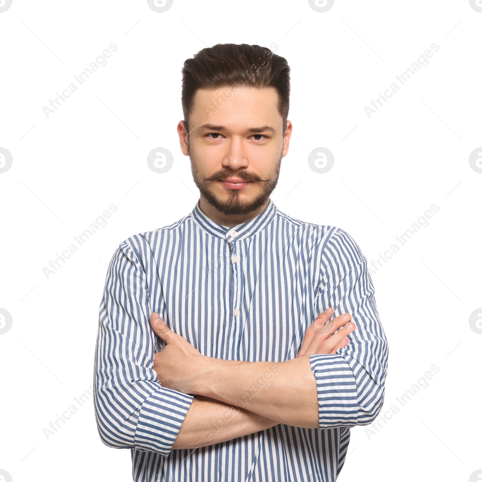 Photo of Handsome man in striped shirt crossing his arms on white background