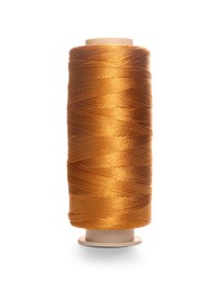 Photo of Spool of dark orange sewing thread isolated on white