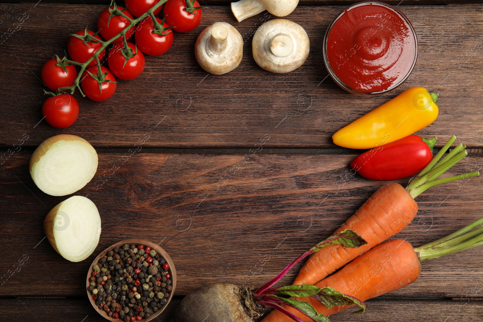 Photo of Frame of ingredients for cooking on wooden table, flat lay. Space for text