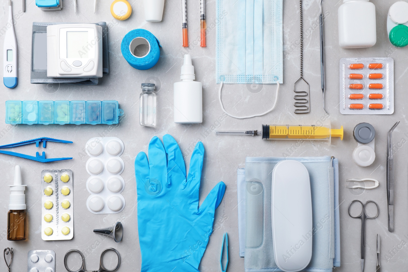 Photo of Flat lay composition with medical objects on grey background