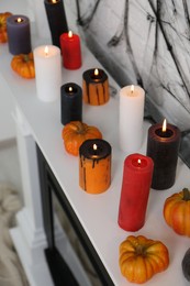 Photo of Fireplace with different Halloween decor indoors, above view. Festive interior