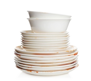 Photo of Pile of dirty dishes on white background