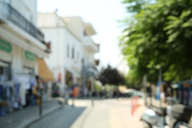 Blurred view of city street on sunny day