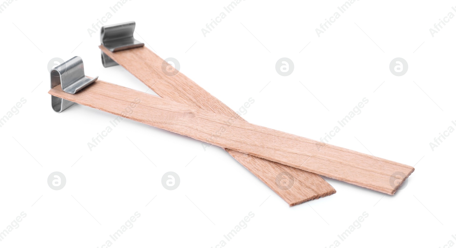 Photo of Wooden wicks with stabilizers on white background. Homemade candle material