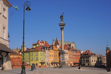 Photo of WARSAW, POLAND - MARCH 22, 2022: Beautiful view of Sigismund's Column in Old Town on sunny day