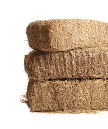 Bales of dried straw isolated on white