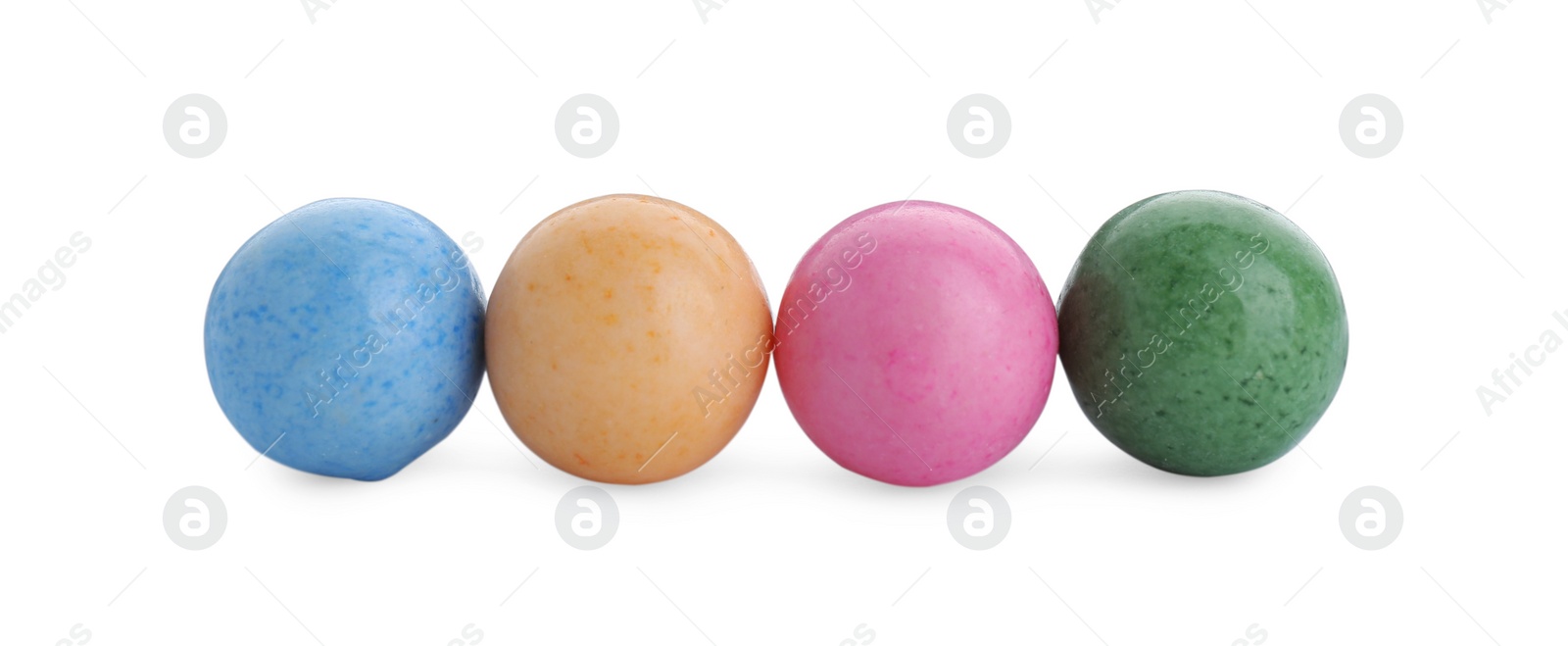 Photo of Bright sweet chewy gumballs isolated on white