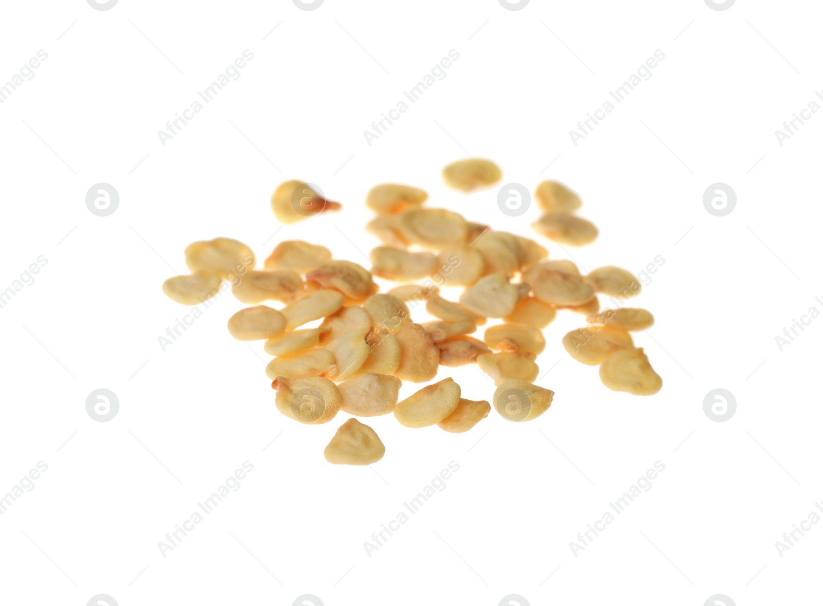 Photo of Pile of raw bell pepper seeds on white background. Vegetable planting