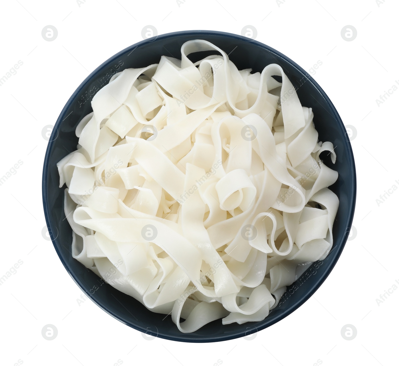 Photo of Bowl with rice noodles isolated on white, top view