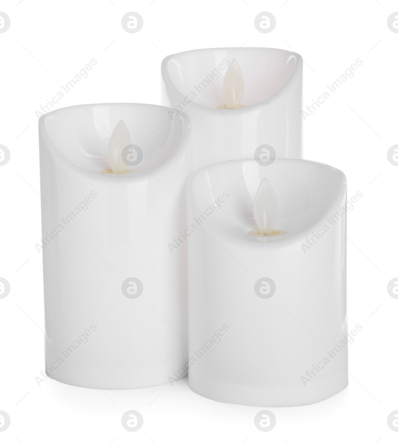 Photo of Decorative flameless LED candles on white background