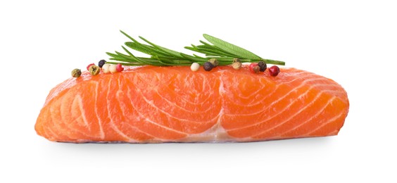 Photo of Piece of fresh raw salmon and spices on white background