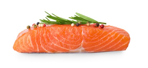 Piece of fresh raw salmon and spices on white background