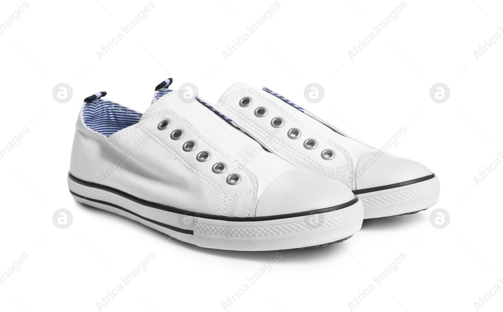 Photo of Pair of stylish sneakers on white background