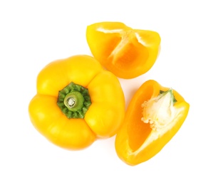 Photo of Whole and cut yellow bell peppers isolated on white, top view