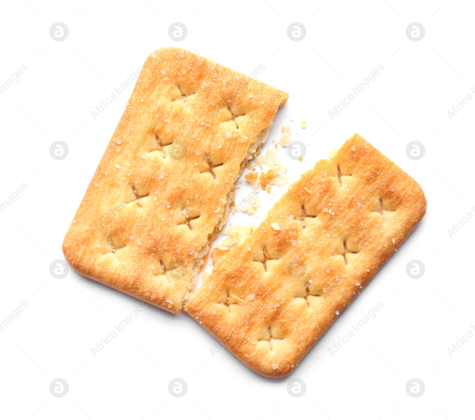 Photo of Broken delicious crispy cracker isolated on white, top view