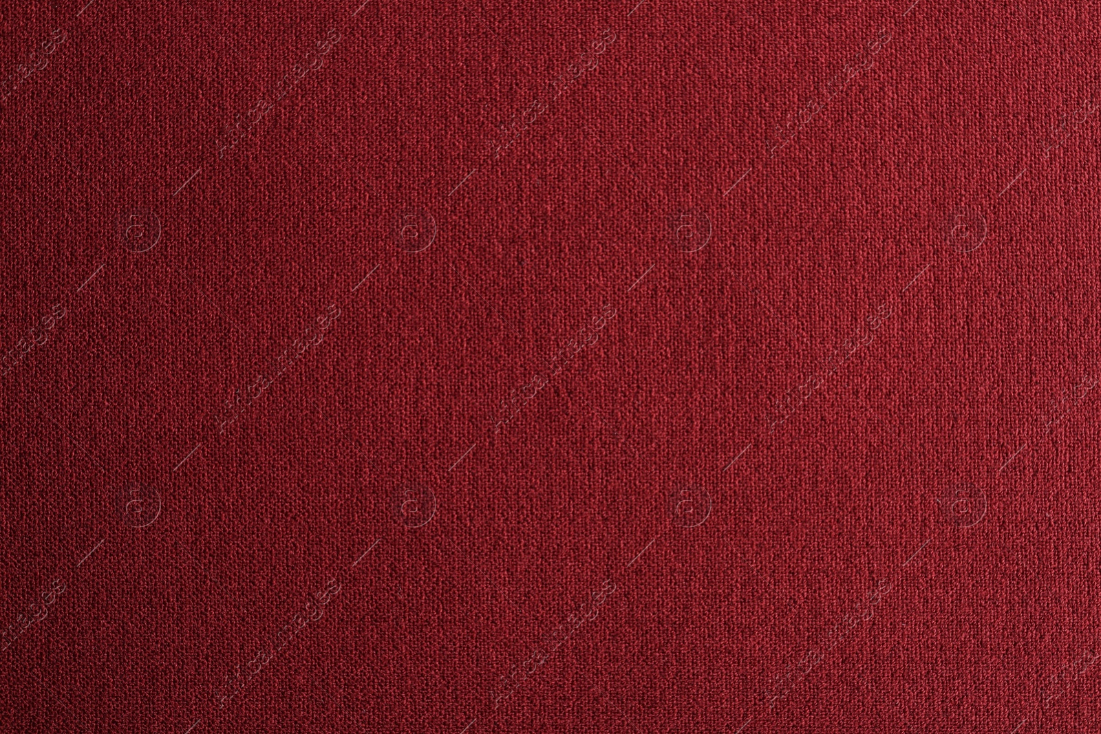 Photo of Texture of beautiful red fabric as background, closeup