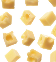 Set of delicious cheese cubes on white background