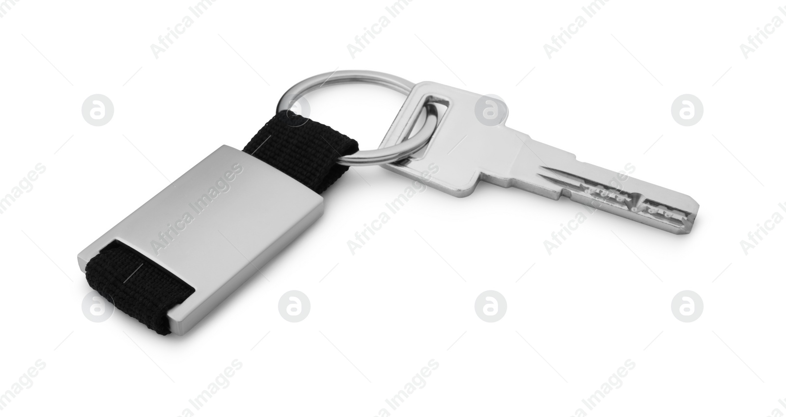 Photo of Key with metallic keychain isolated on white