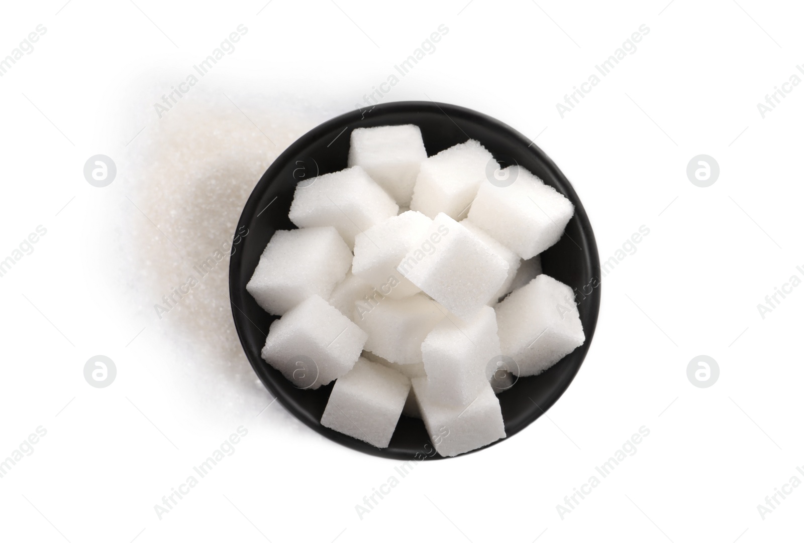Photo of Granulated and cubed sugar with bowl on white background, top view