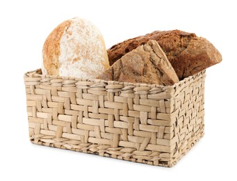 Photo of Basket with different types of fresh bread isolated on white