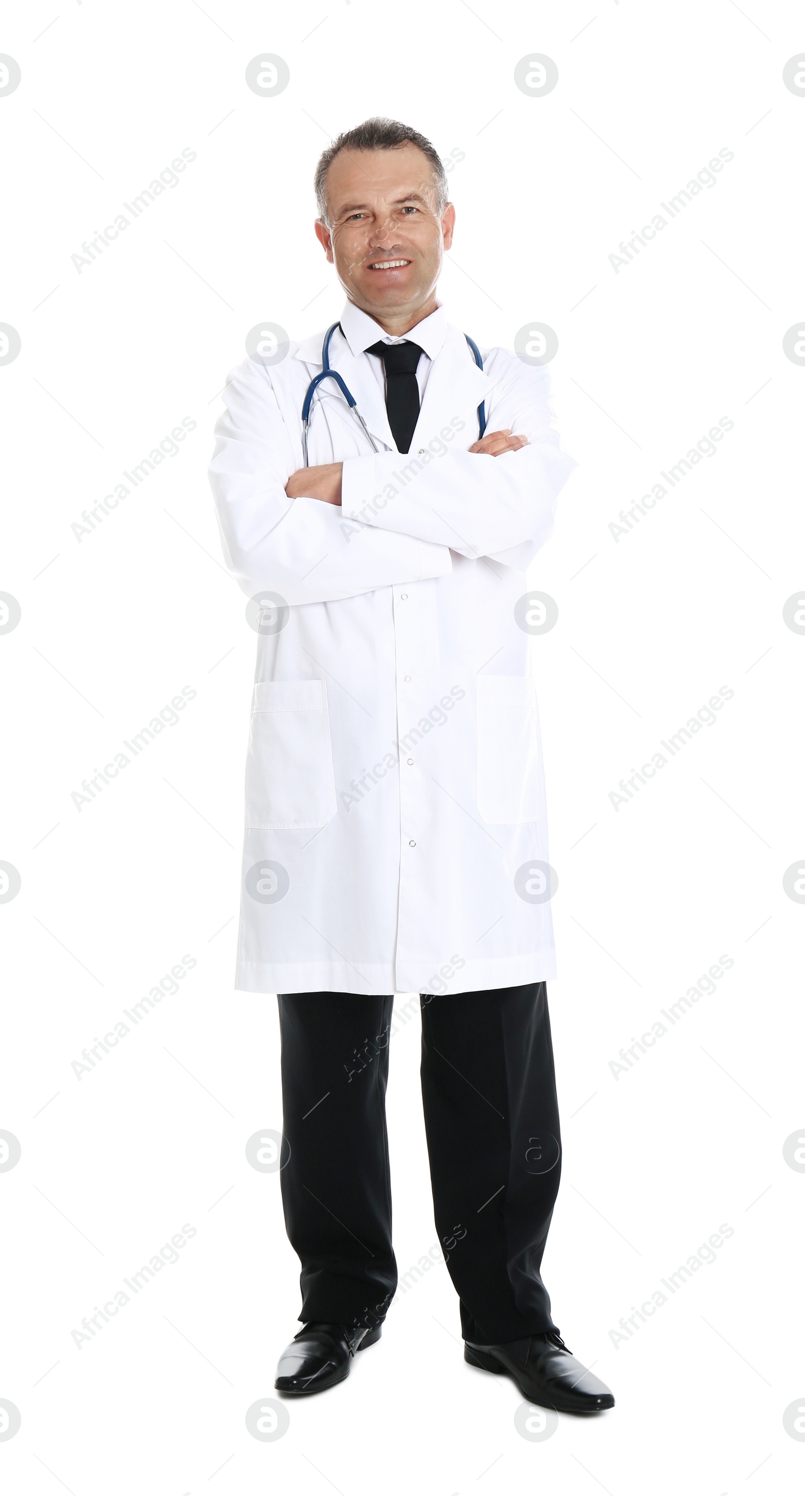 Photo of Full length portrait of experienced doctor in uniform on white background. Medical service