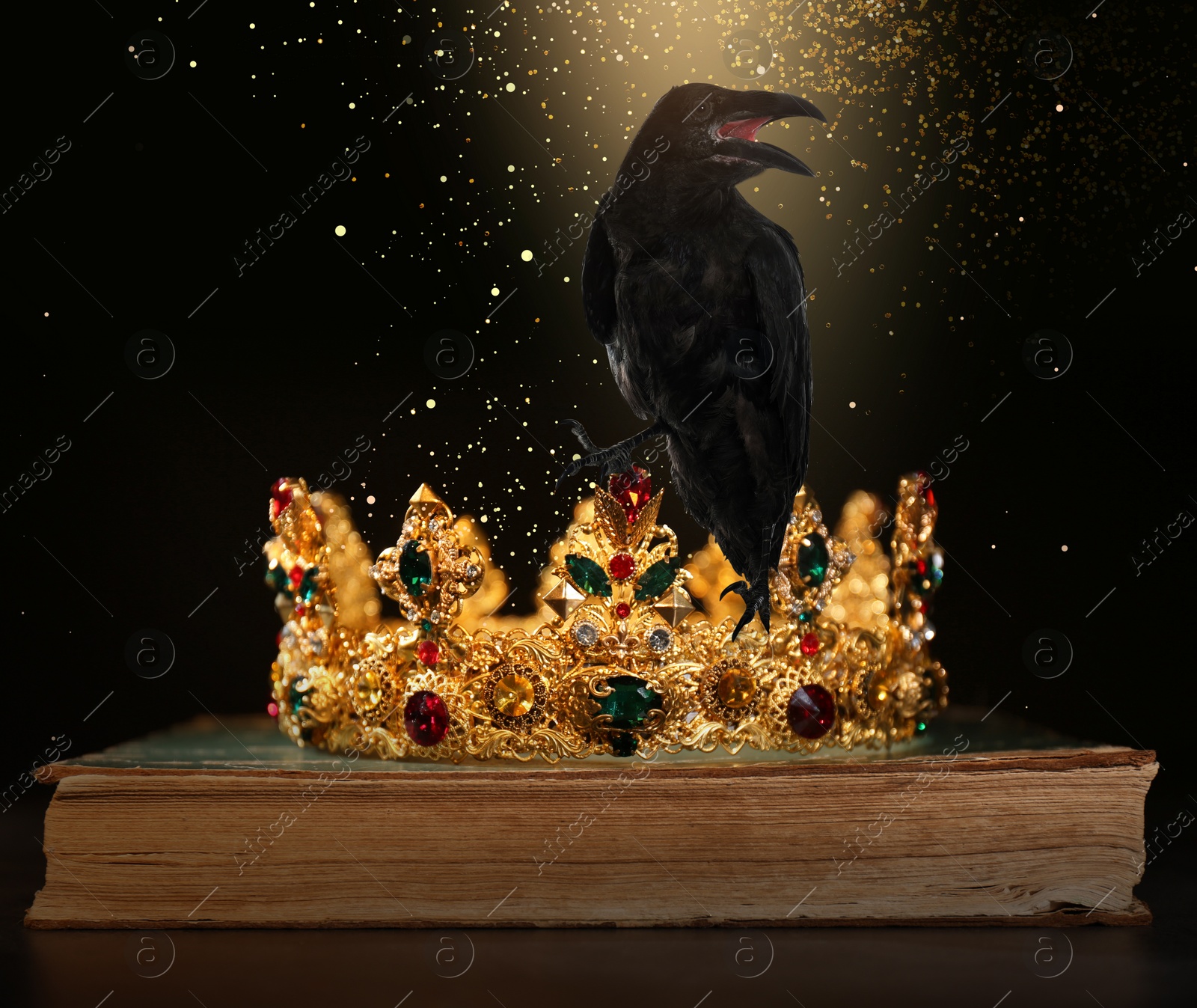 Image of Fantasy world. Black crow lit by magic light sitting on golden crown 