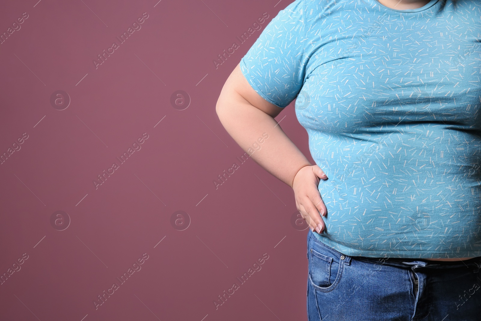 Photo of Overweight woman on color background