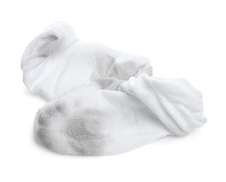 Pair of dirty socks on white background