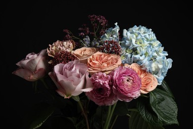 Photo of Beautiful bouquet of fresh flowers on dark background