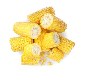 Pieces of corncobs on white background, top view