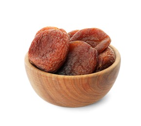 Photo of Wooden bowl with tasty dried apricots isolated on white