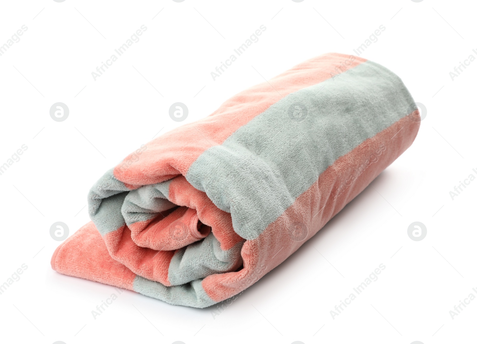 Photo of Rolled striped beach towel isolated on white