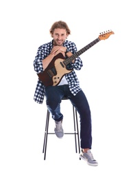 Photo of Young man with electric guitar on white background