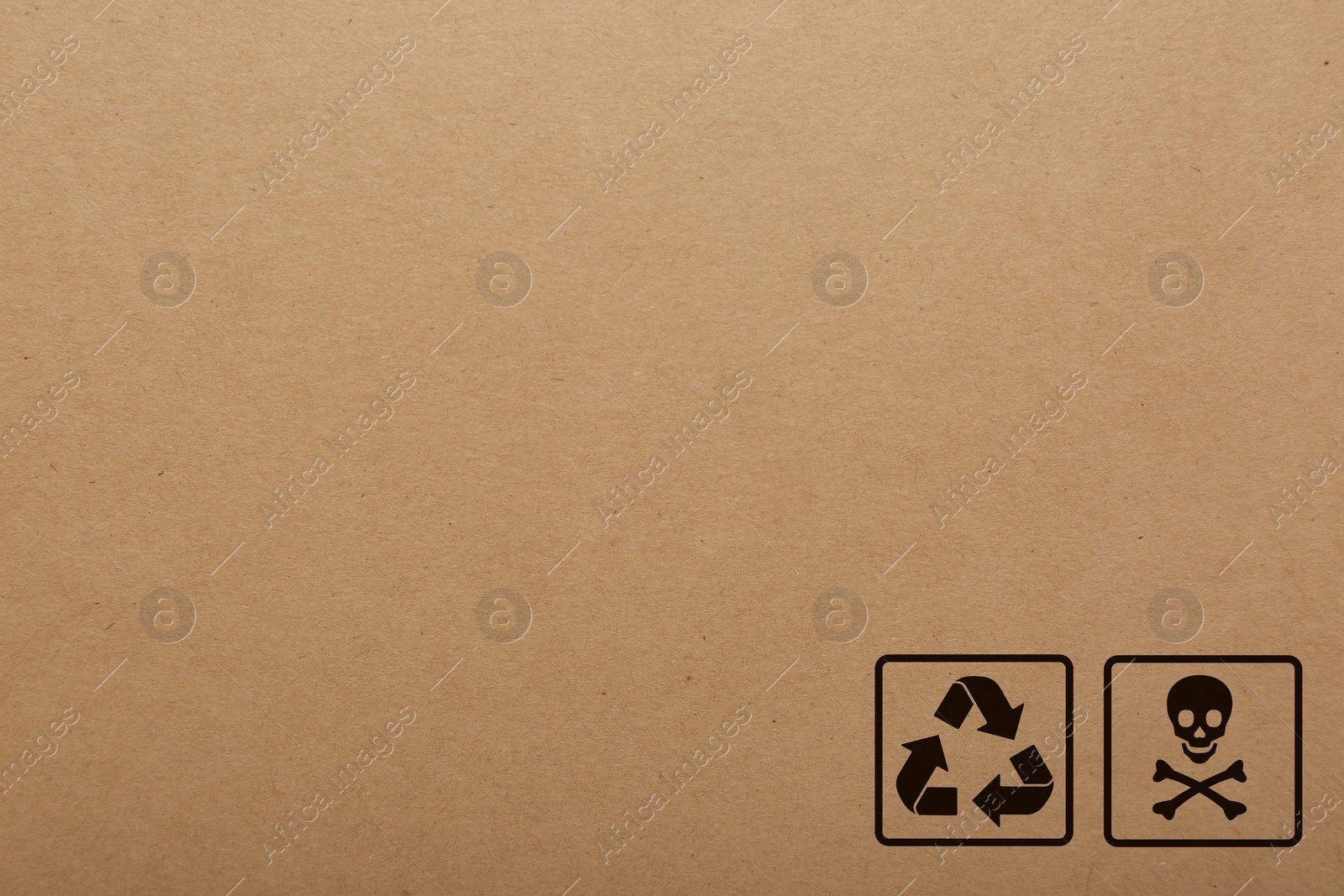 Image of Cardboard box with packaging symbols as background, closeup