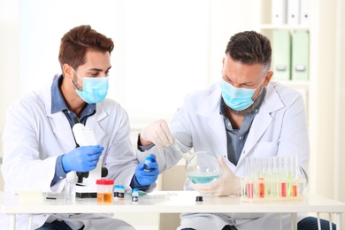 Scientists working in laboratory. Research and analysis