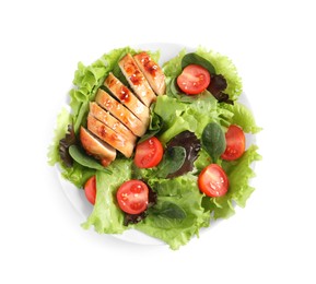 Photo of Delicious salad with chicken, cherry tomato and spinach in bowl isolated on white, top view