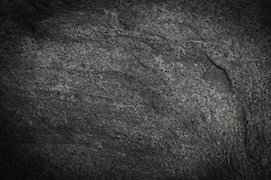 Image of Texture of dark grey stone surface as background, closeup