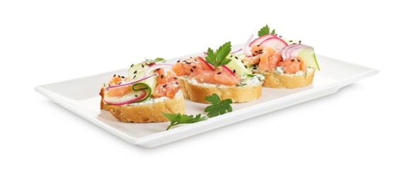 Photo of Tasty canapes with salmon, cucumber, radish and cream cheese isolated on white