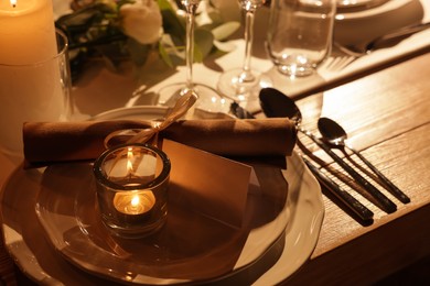 Photo of Festive table setting with beautiful tableware and decor, closeup