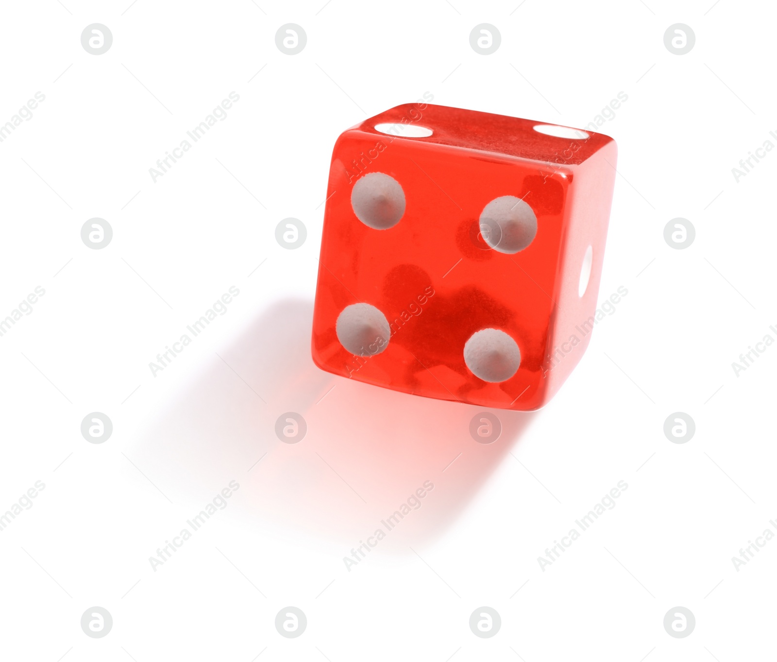 Photo of One red game dice isolated on white