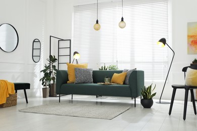 Modern living room interior with stylish comfortable sofa