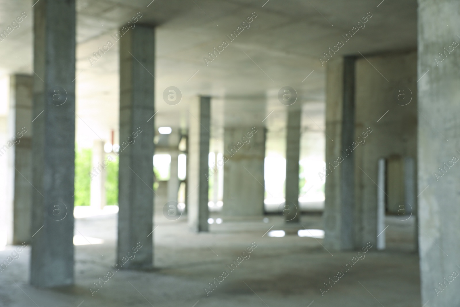 Photo of Blurred view of unfinished building indoors. Construction safety rules