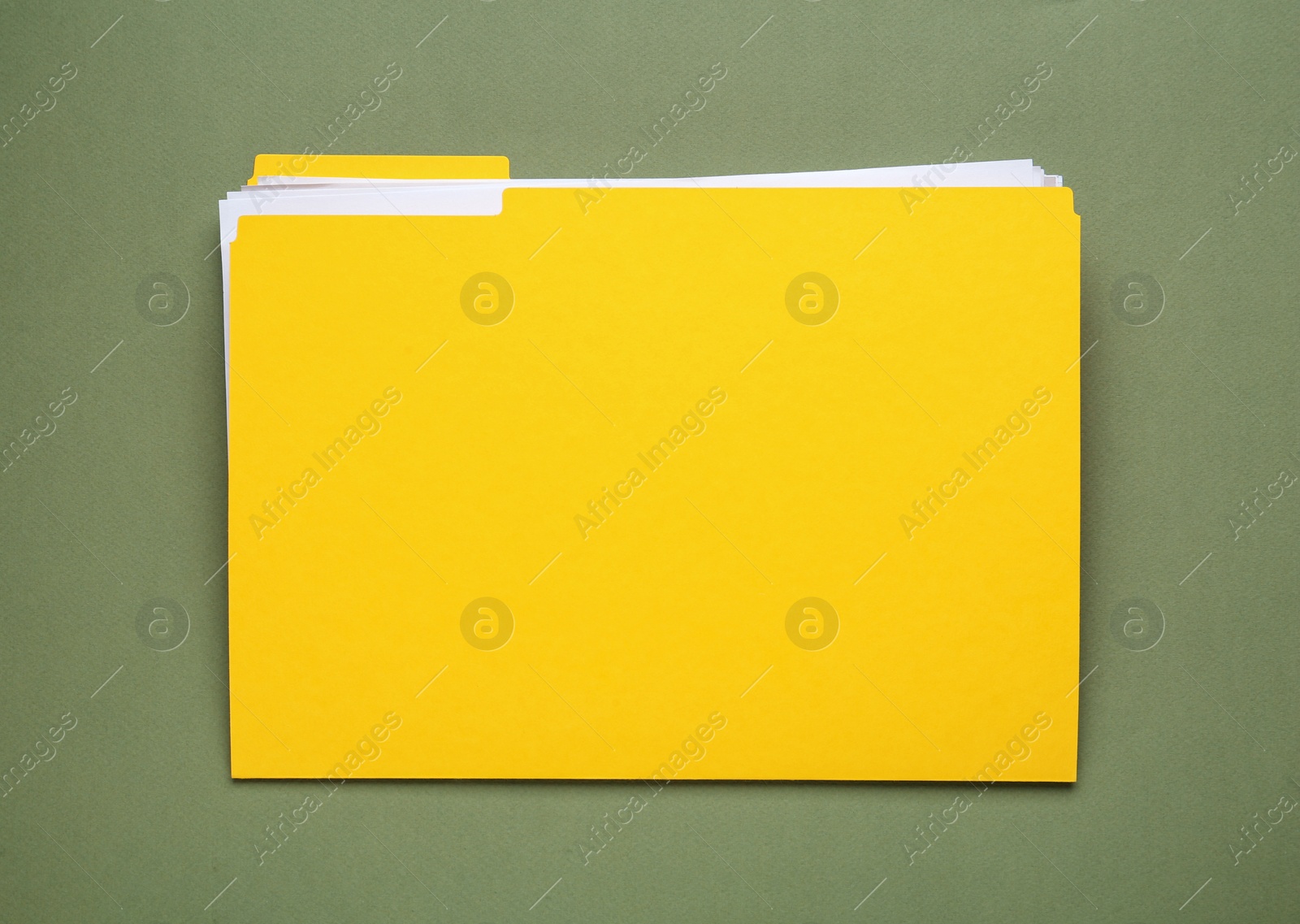 Photo of Yellow file with documents on olive background, top view