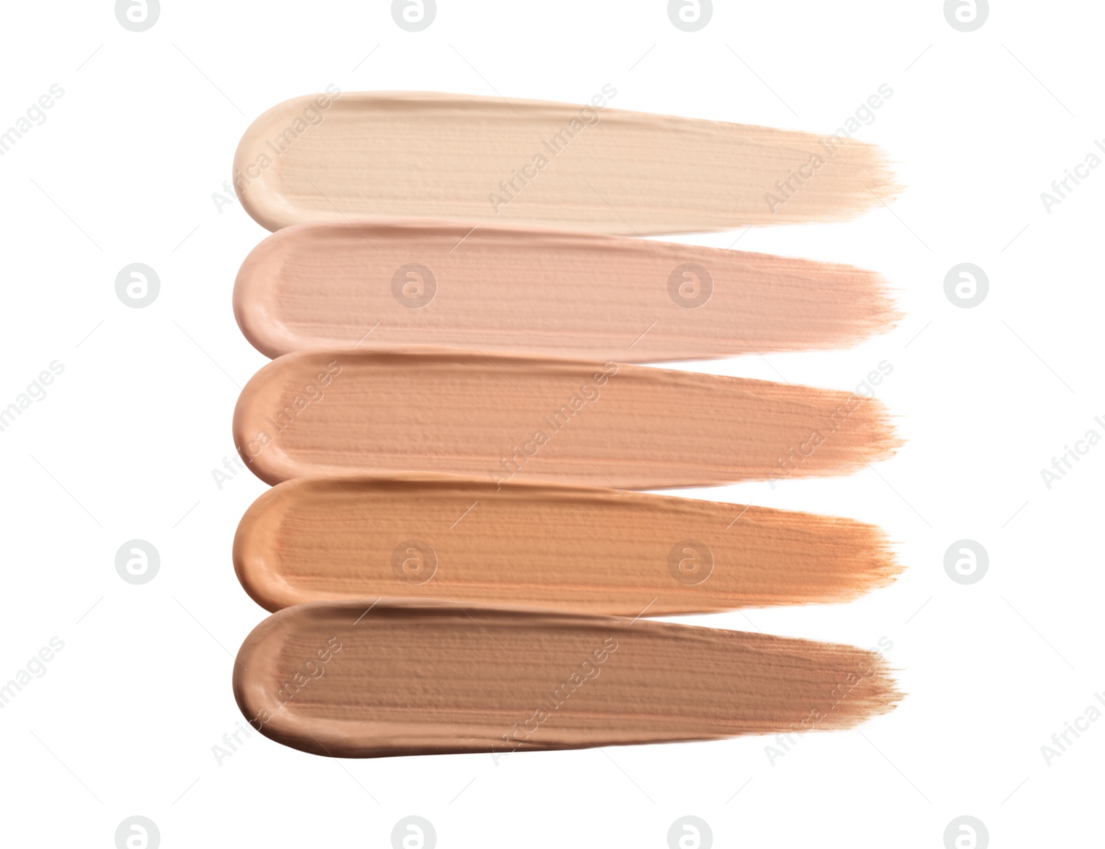 Image of Different shades of liquid skin foundation on white background, top view