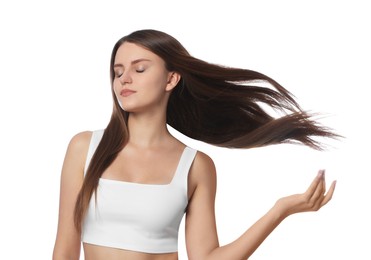 Photo of Young woman with strong healthy hair on white background