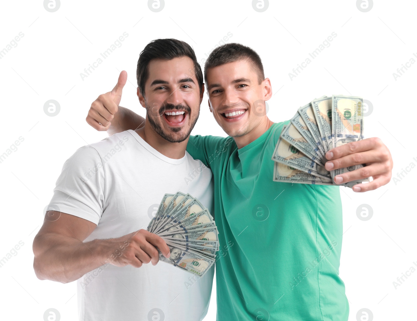 Photo of Handsome young men with dollars on white background