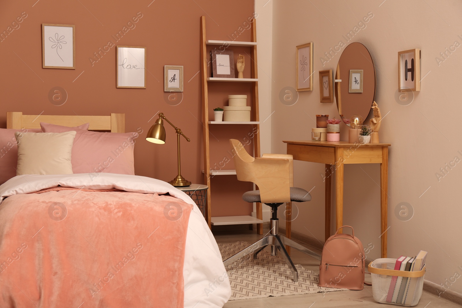 Photo of Teenage girl's bedroom interior with stylish furniture and beautiful decor elements