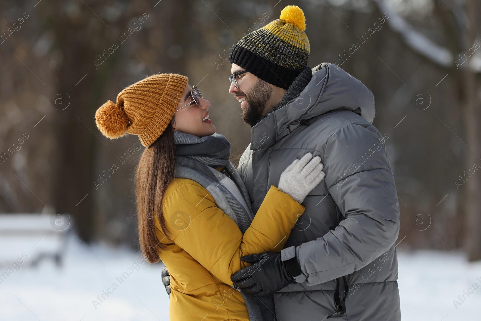 Photo of Beautiful happy couple outdoors on winter day