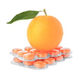 Photo of Fresh orange and blisters with cough drops isolated on white