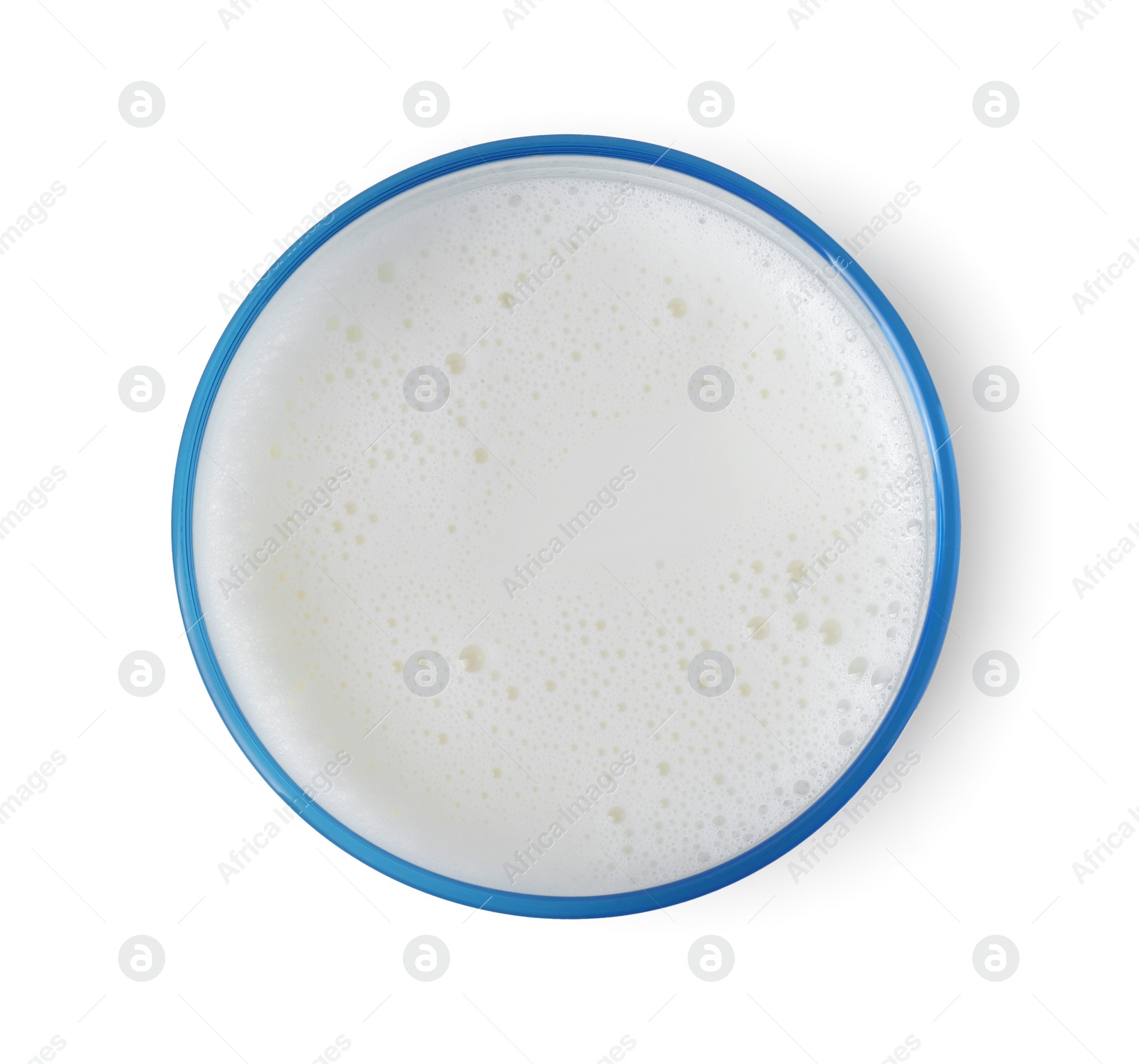 Photo of Glass of fresh milk isolated on white, top view